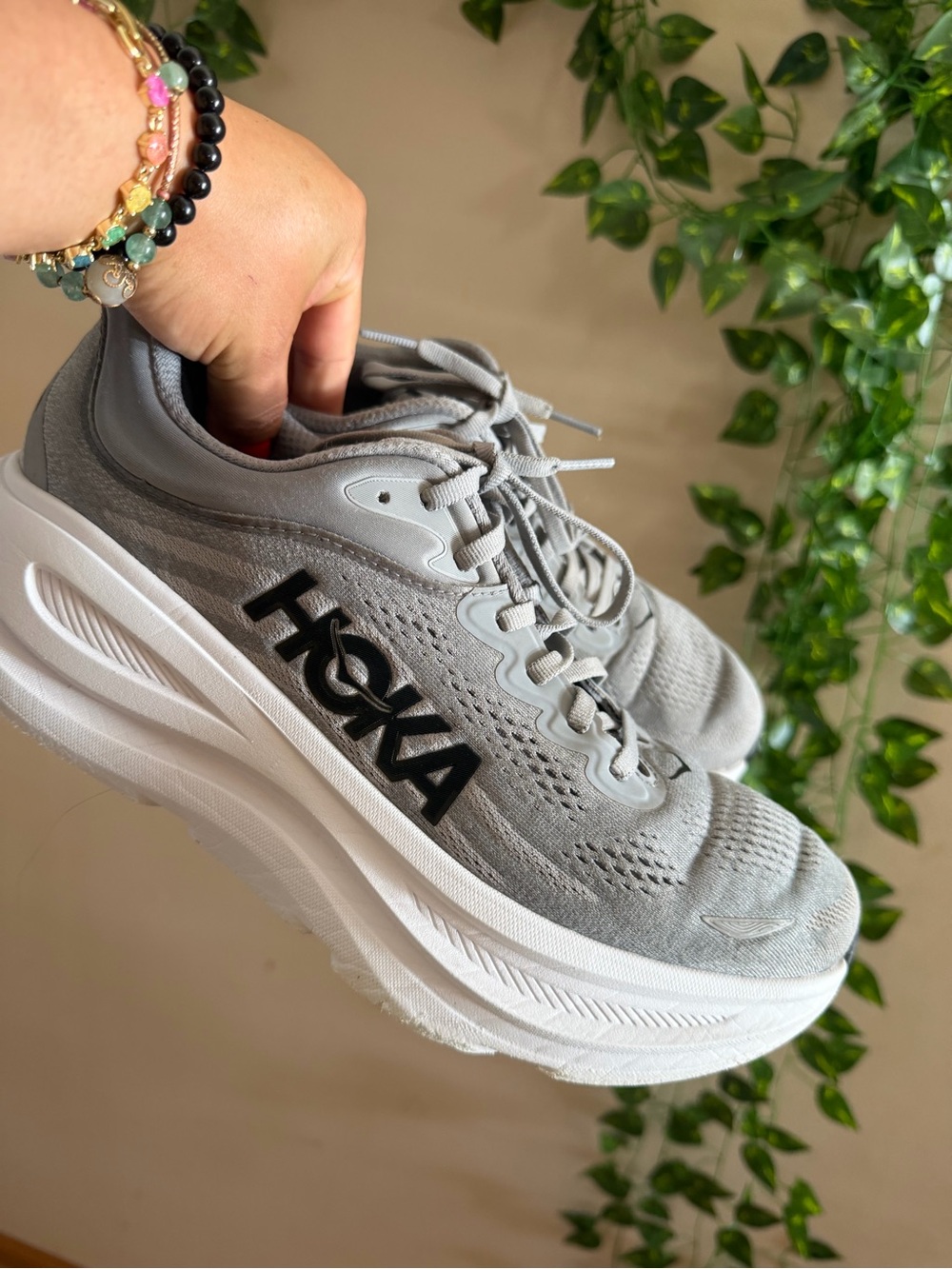Hoka men’s  Light Gray Athletic Running Shoes with Black Logo